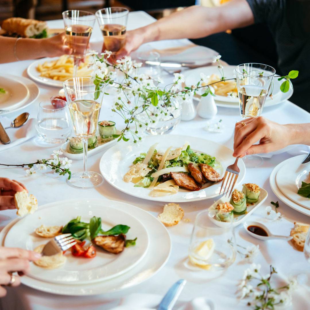  a richly set table in the restaurant Lachinger 